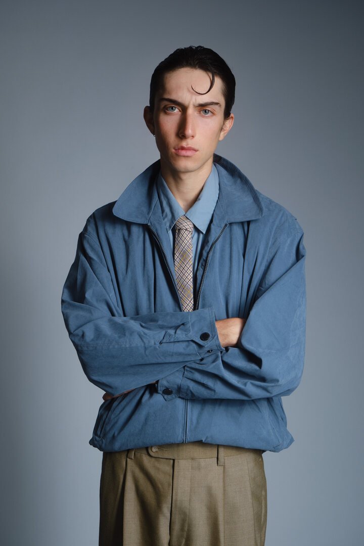 Personal styling by Angelina Coscuna — tailored blue jacket and tie